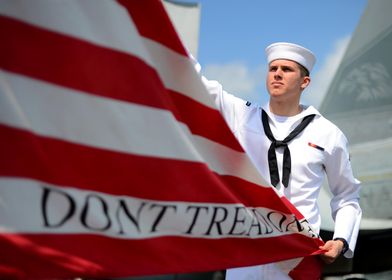 Hoisting the Navy Jack