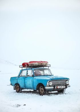 blue car in winter