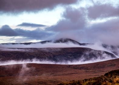 Mountains in morning fog