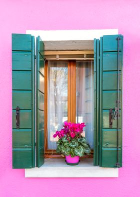 Window on pink house Italy