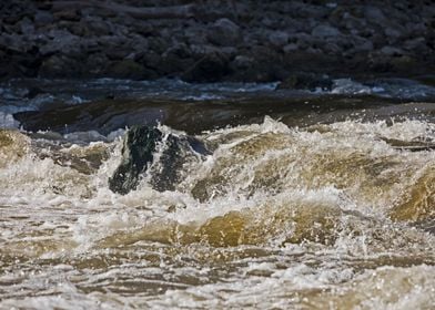 River splashing over rock