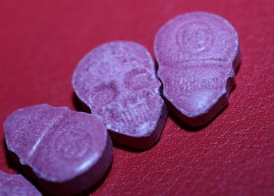 Pink skull ecstasy pill