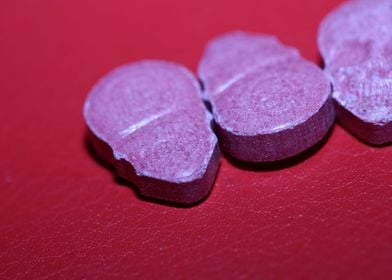 Pink skull ecstasy pill