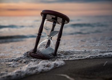 Sand clock on the beach