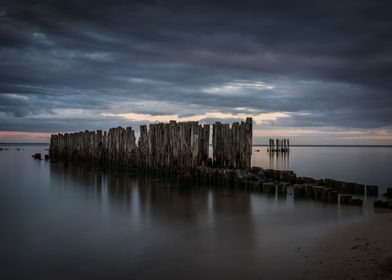 Old Pier And Sea At Dusk