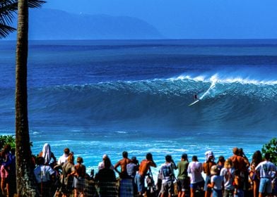 Surfing at Waimea Bay