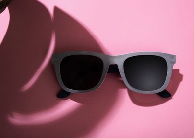 Sunglasses on pink