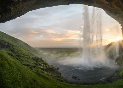 Waterfall over a cave