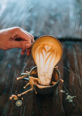 Latte art poured coffee