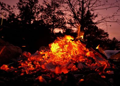 Campfire glowing sunset
