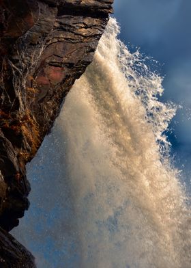 Underneath the waterfall