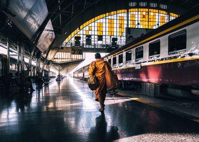 Monk at a train station