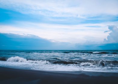 Waves crashing on the sand