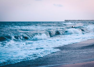 Sunset over ocean waves