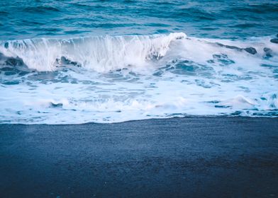 Wave crashing on the sand