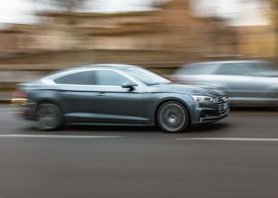 Silver Audi in motion blur