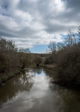 Spring Clouds Over River