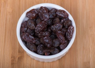 Raisins on Wooden Board