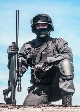 Police sniper with rifle