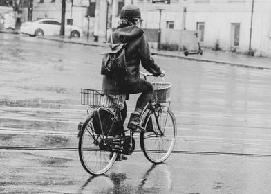 Woman bicycle in rain