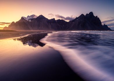 Sunset on a black beach