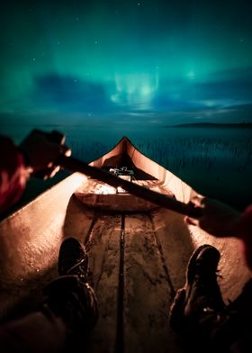 kayak under northern light