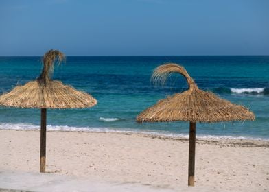 Beach with umbrellas and t