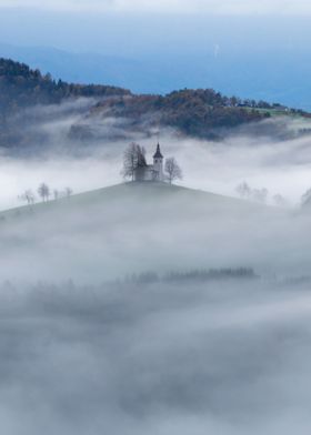 Church covered in fog