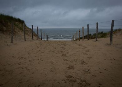 Path to the beach cloudy