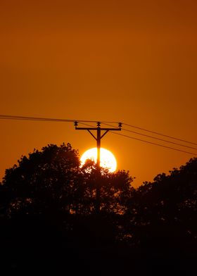 Sunset with Pylon Outline