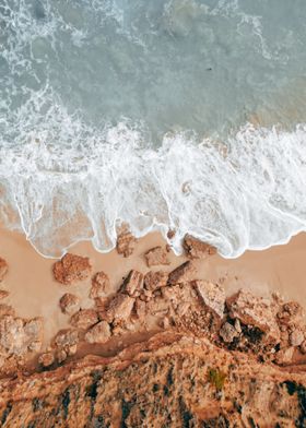 Beach With Waves and Rocks