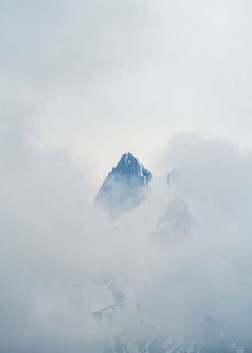 Mountain summit in clouds