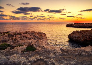 Sunset and cliff sea coast