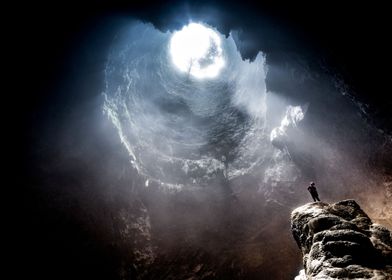 alone in a cave landscape