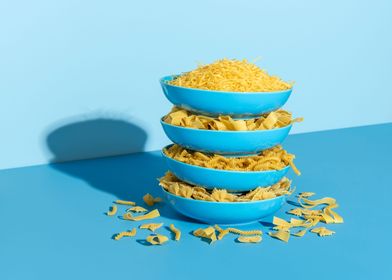 Raw pasta variety in bowls