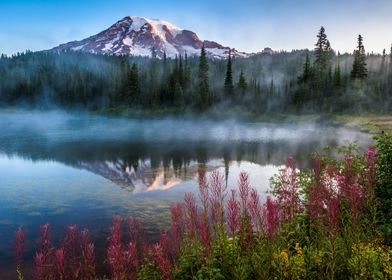 Foggy lake with a mountain