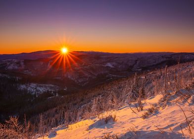 Winter dawn in mountains