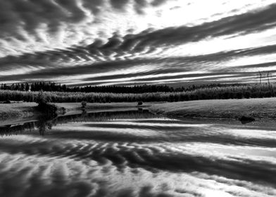 Dramatic clouds reflection