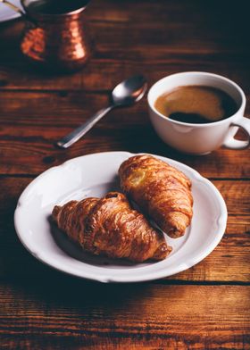 croissants with cup coffee