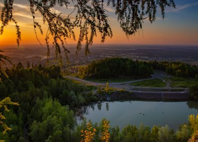 Sunset over lake and trees