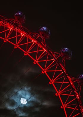 London eye with moon