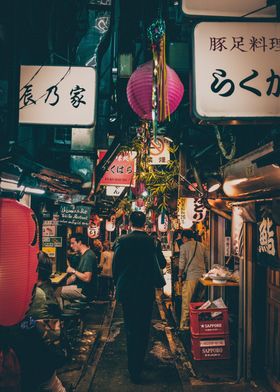 Man walking between stores