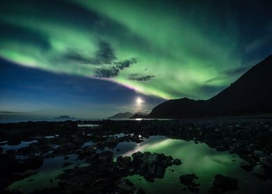 Seashore aurora reflection