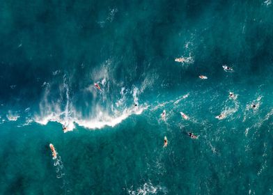 Surfers from above Hawaii