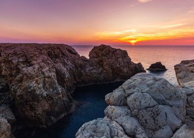 Sunset and cliff sea coast