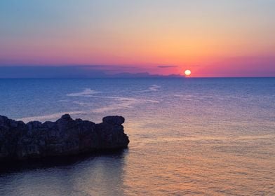 Sunset and cliff sea coast