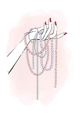 Female hand with pearls