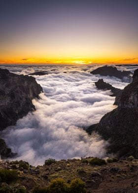 Sunset over the clouds