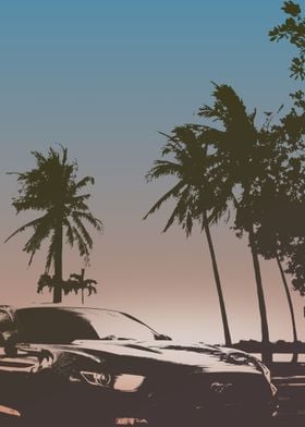 car and palm in sunset