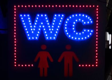 WC neon sign street hangin